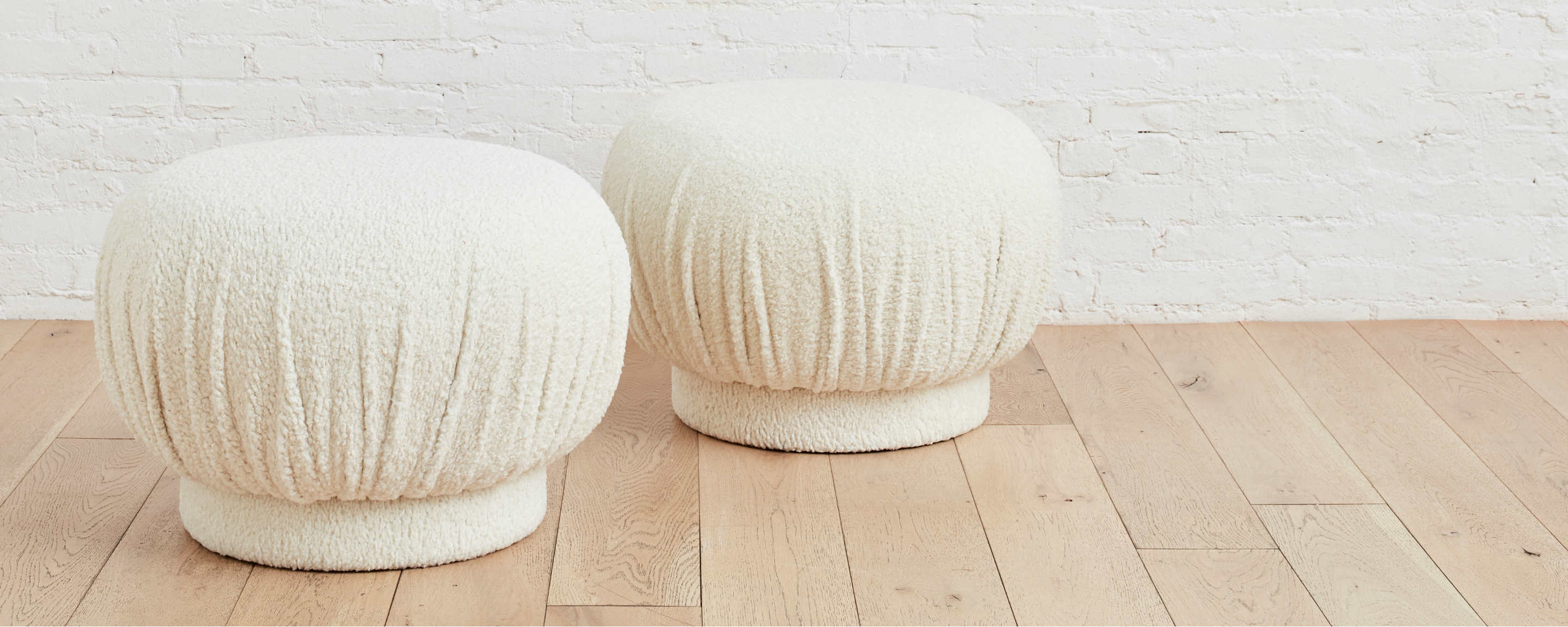 bel air swivel ottoman in sherpa cloud