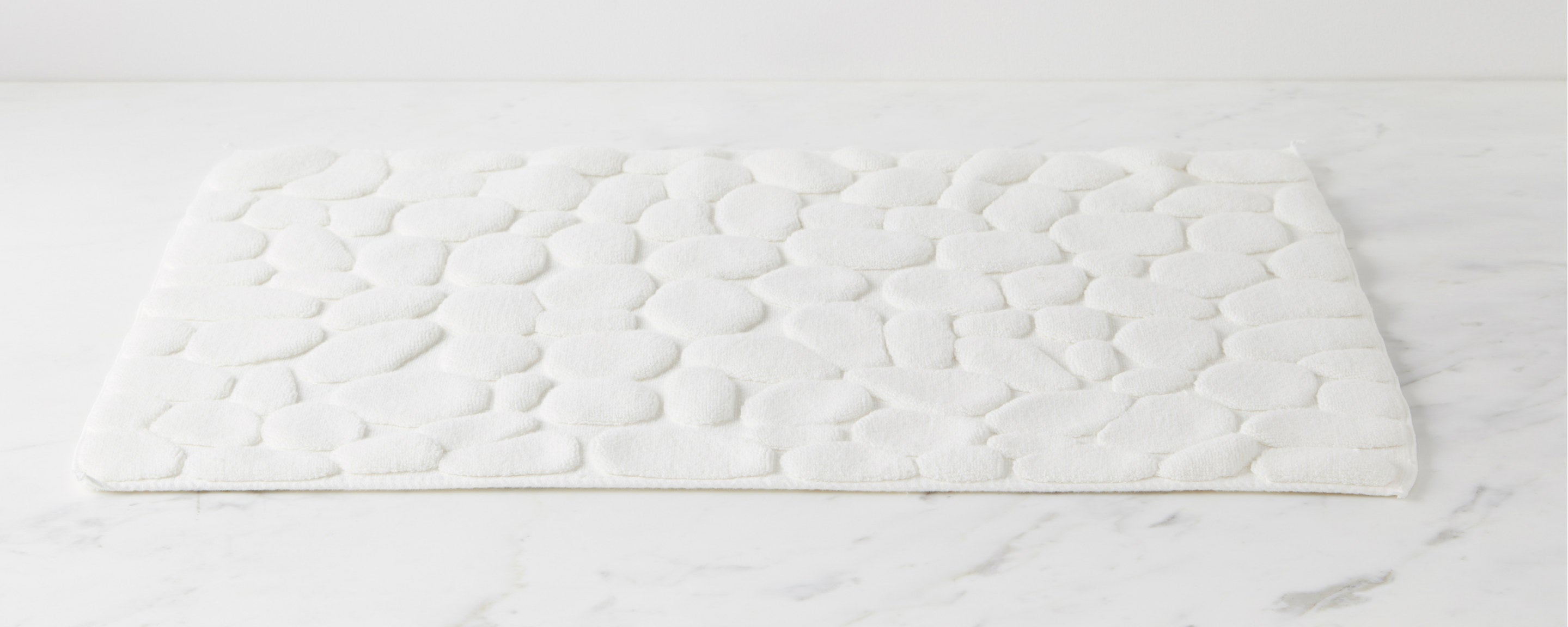 pebble white bath mat